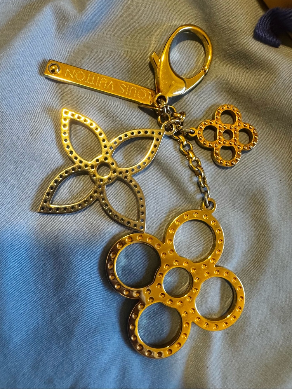 Louis Vuitton Gold-Tone Floral Logo Key Holder